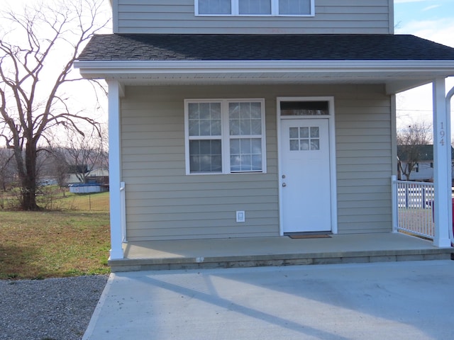 property entrance featuring a porch