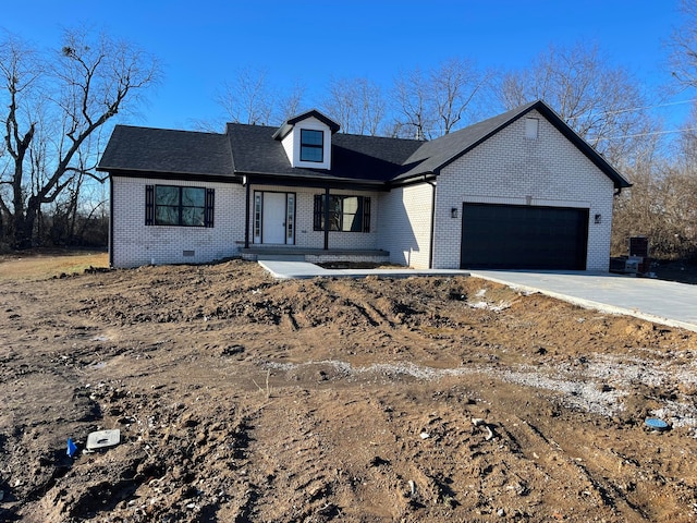 view of front of house with a garage