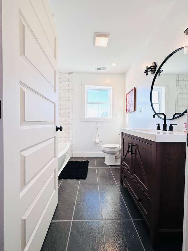 full bathroom featuring vanity, toilet, washtub / shower combination, and tile patterned floors