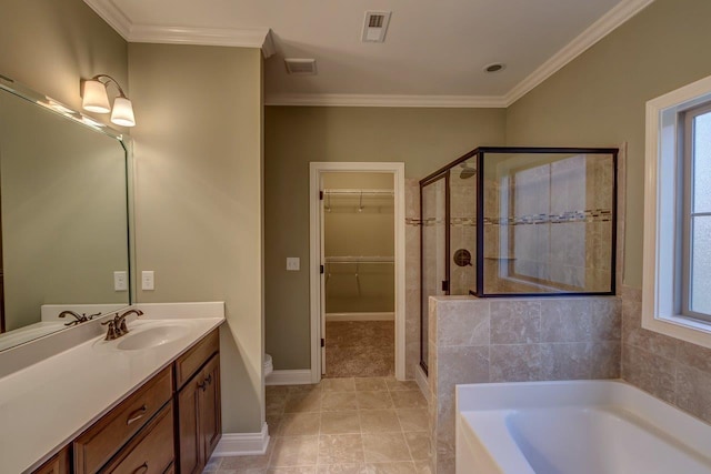 bathroom with vanity, plus walk in shower, plenty of natural light, and ornamental molding