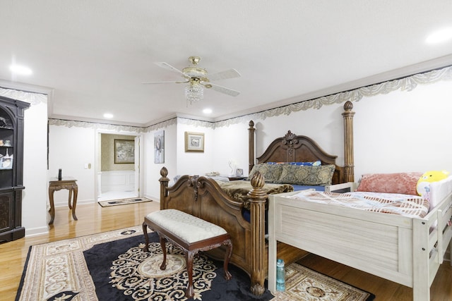 bedroom featuring ceiling fan and hardwood / wood-style floors