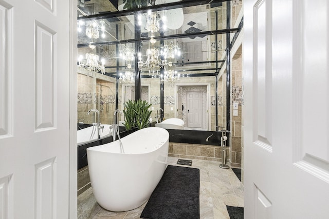 bathroom featuring tile flooring and a bath to relax in