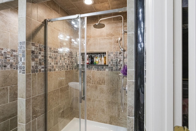 bathroom featuring walk in shower