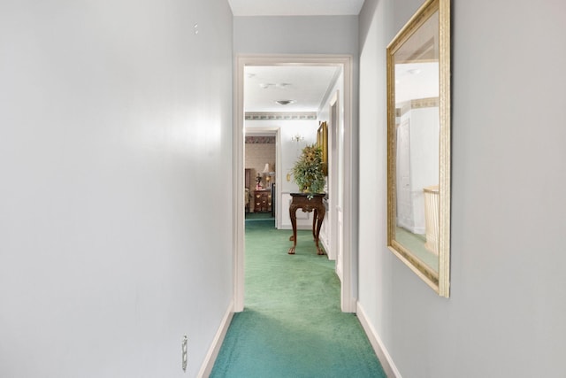 hall featuring carpet floors