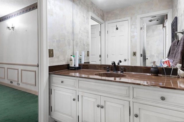 bathroom with vanity with extensive cabinet space