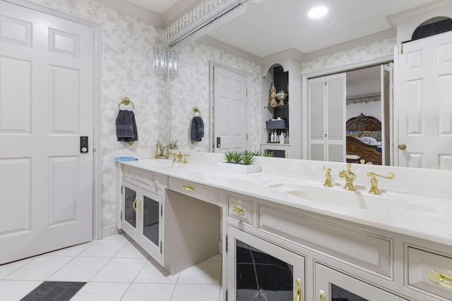 bathroom featuring crown molding, tile floors, and double sink vanity