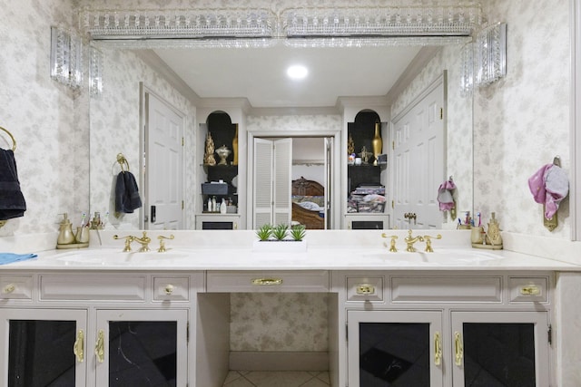 bathroom with double sink, tile flooring, and large vanity