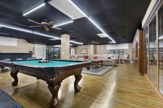 rec room featuring billiards, ceiling fan, a drop ceiling, and light hardwood / wood-style flooring