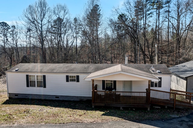 view of front of house featuring a wooden deck