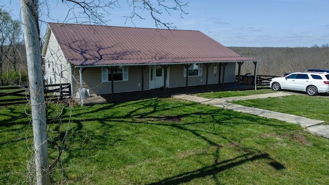 427 Sharpsburg Rd, Sharpsburg, KY 40374 - view of front of house with metal roof, a front yard, and a porch