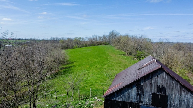 427 Sharpsburg Rd, Sharpsburg, KY 40374 - entry to storm shelter with a lawn, an outdoor structure, and a barn