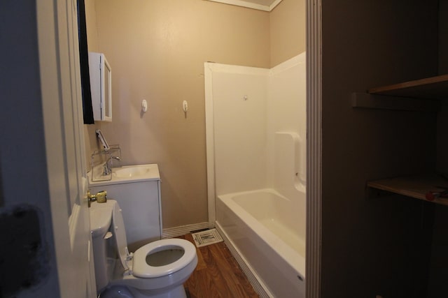 full bathroom with toilet, vanity, shower / bathing tub combination, and hardwood / wood-style flooring