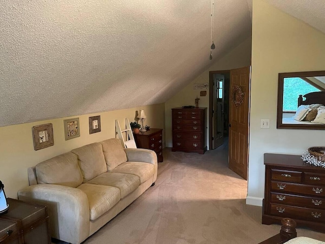 interior space with vaulted ceiling and a textured ceiling