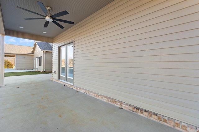 view of patio with french doors and ceiling fan