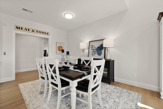 dining room featuring light hardwood / wood-style flooring