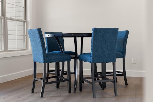 dining area featuring hardwood / wood-style floors