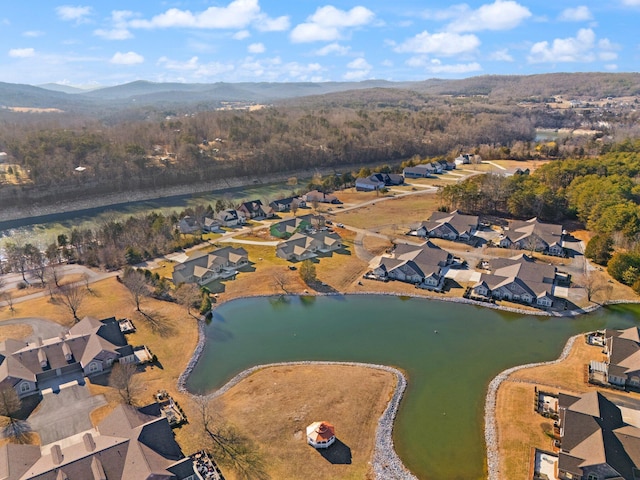 bird's eye view featuring a water and mountain view