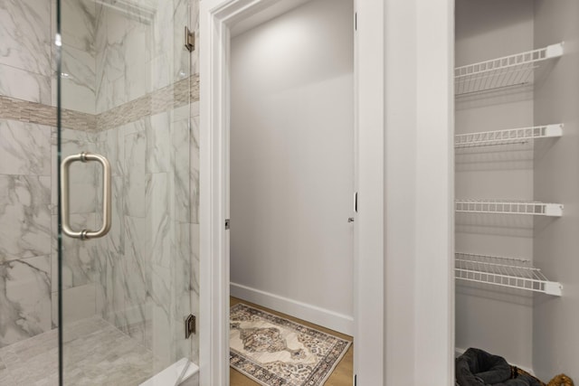 bathroom with an enclosed shower