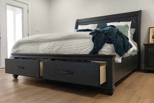 bedroom featuring light hardwood / wood-style flooring