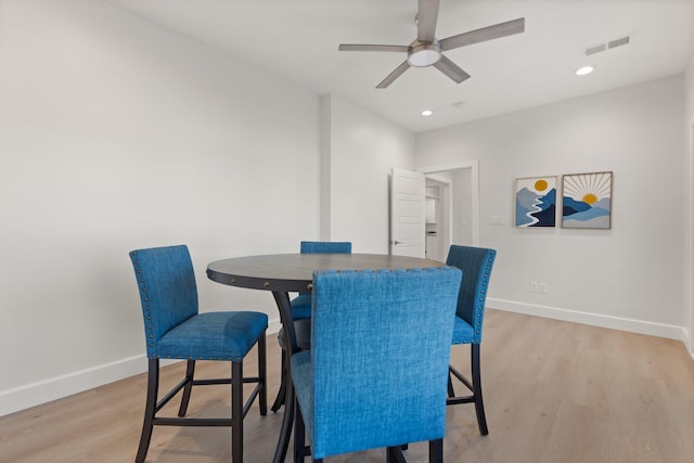 dining space featuring ceiling fan and light hardwood / wood-style floors