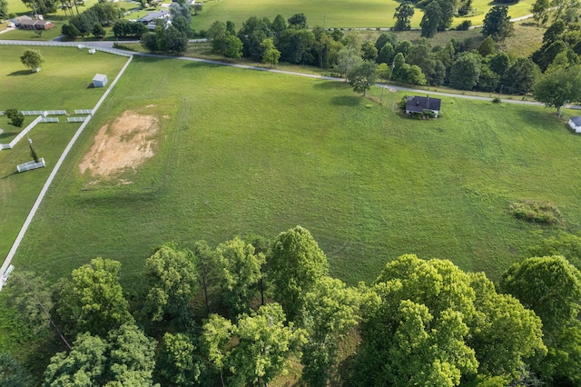 birds eye view of property featuring a rural view