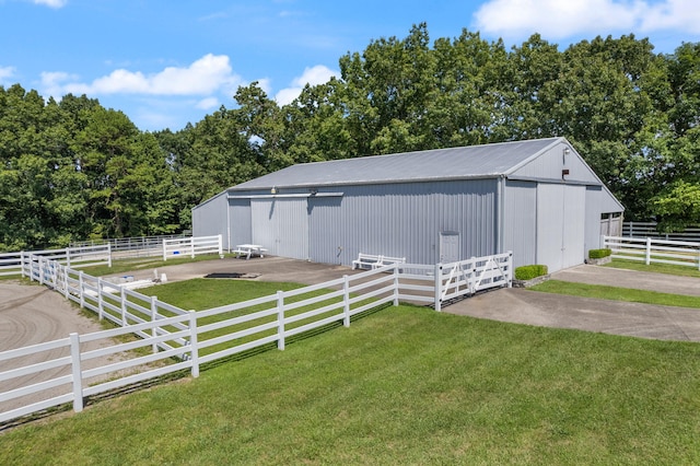 view of outdoor structure featuring a rural view