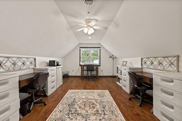 office space with ceiling fan, vaulted ceiling, and dark hardwood / wood-style flooring