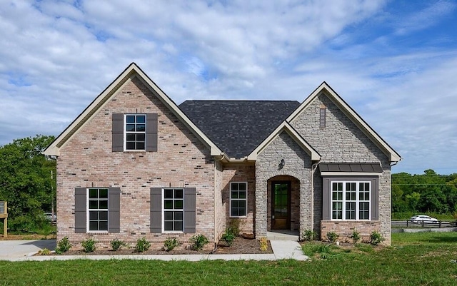 view of front facade with a front yard