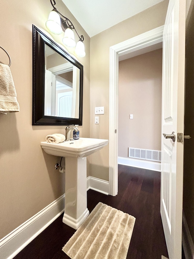 bathroom featuring hardwood / wood-style flooring