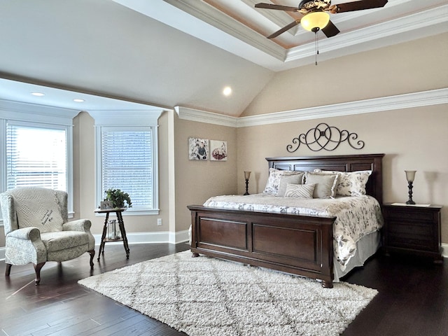 bedroom featuring dark hardwood / wood-style flooring, ornamental molding, and ceiling fan