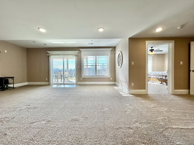 unfurnished living room with light carpet