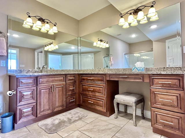 bathroom with vanity and an enclosed shower