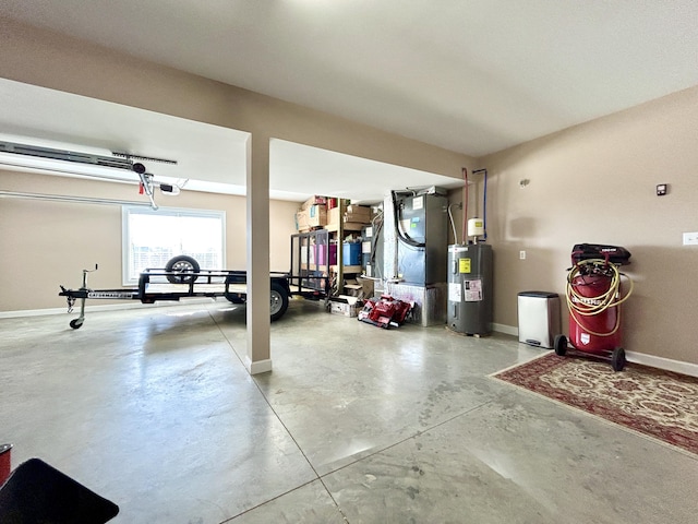 garage featuring a garage door opener and electric water heater