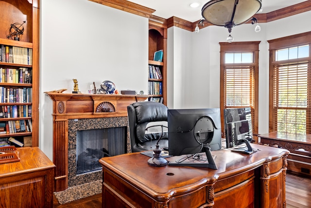 foyer entrance with dark wood-type flooring, ornamental molding, and french doors