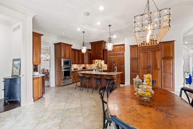 sitting room featuring ornamental molding and dark hardwood / wood-style floors