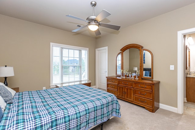 bedroom with ceiling fan and carpet