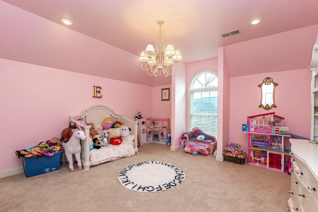 carpeted bedroom with vaulted ceiling and a notable chandelier