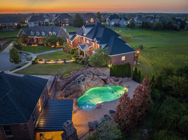 view of swimming pool featuring pool water feature