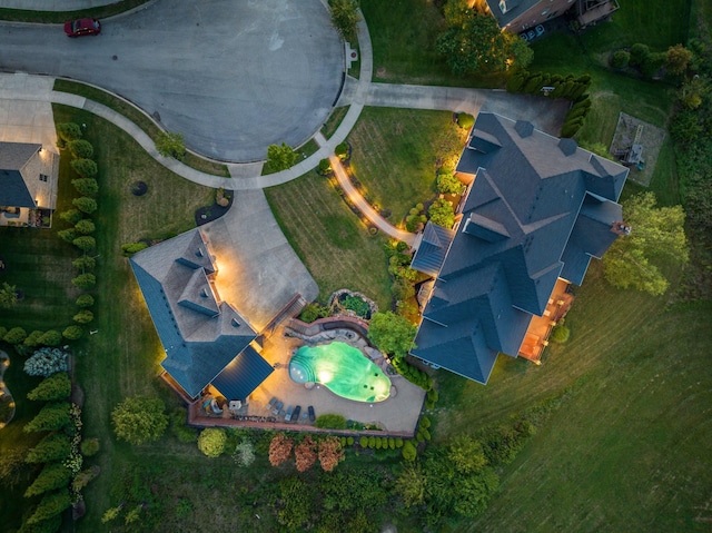 view of swimming pool featuring pool water feature and a patio