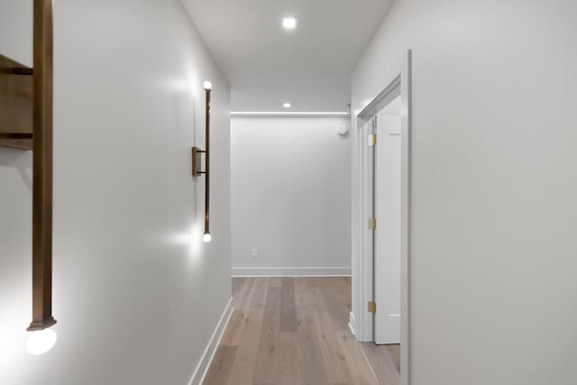 hallway featuring light wood-type flooring