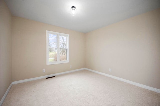 view of carpeted spare room