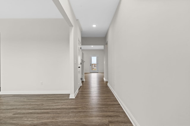 hall featuring dark wood-type flooring