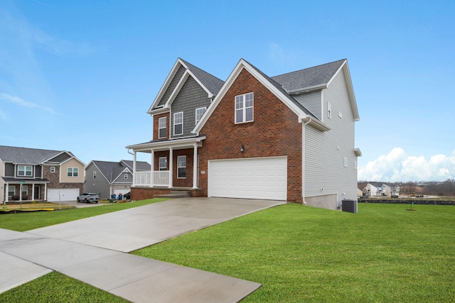 view of front of property with central AC unit, a garage, and a front lawn