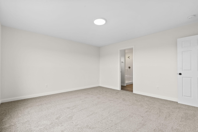 unfurnished room with carpet flooring