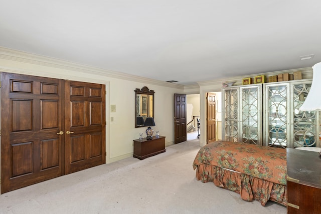 carpeted bedroom featuring crown molding