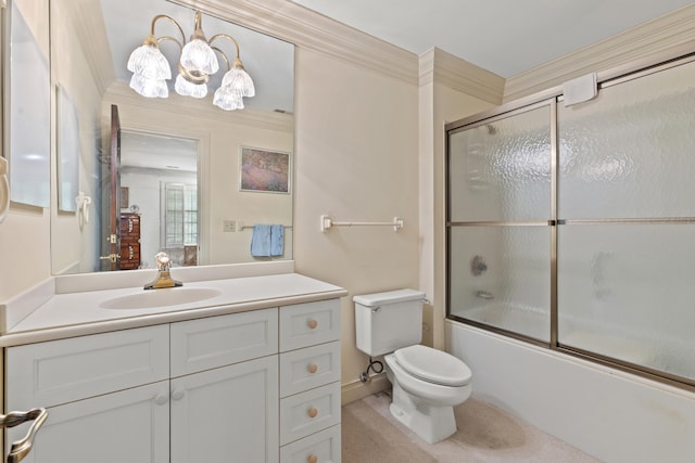 full bathroom featuring crown molding, bath / shower combo with glass door, toilet, and vanity