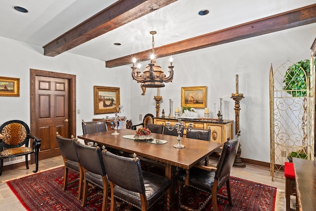 dining area featuring beamed ceiling and light tile floors