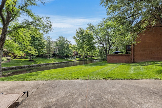 view of yard featuring a water view