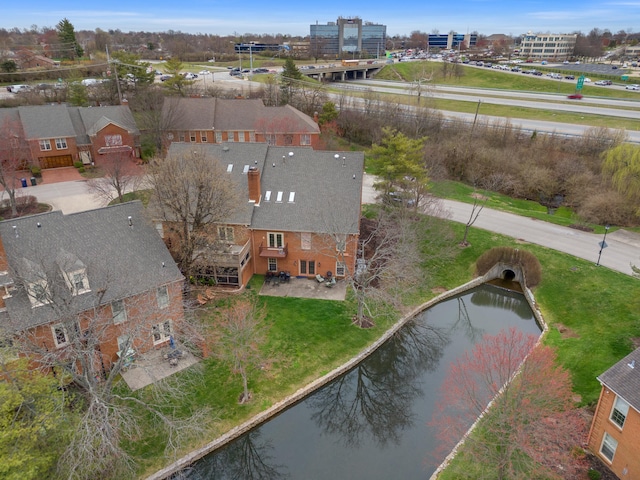 bird's eye view with a water view