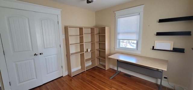 interior space with hardwood / wood-style floors